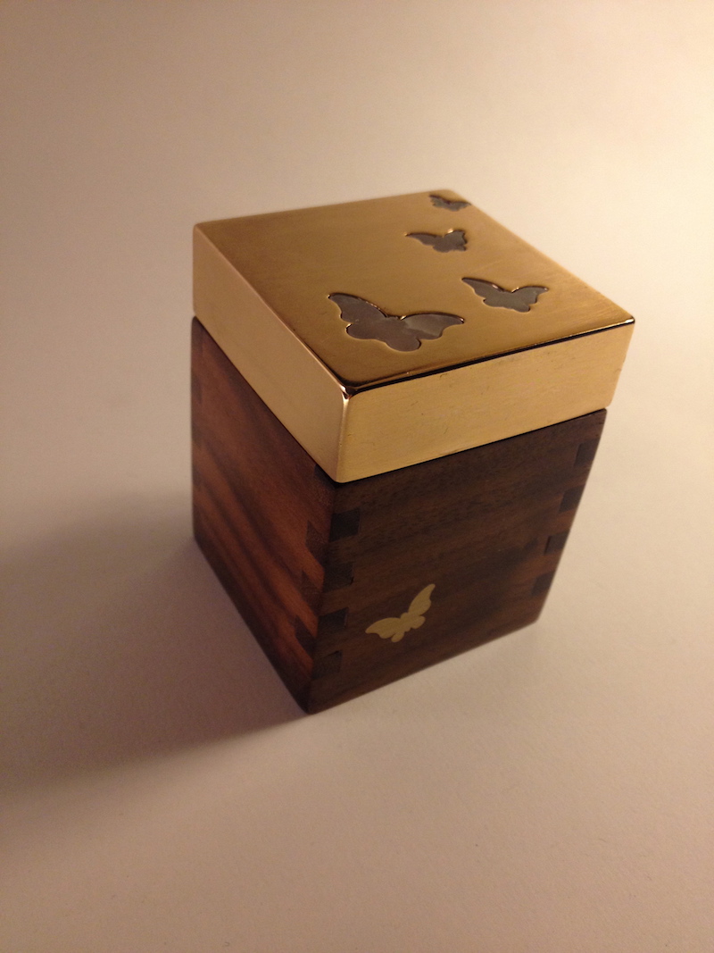 Walnut box with stone and brass inlay