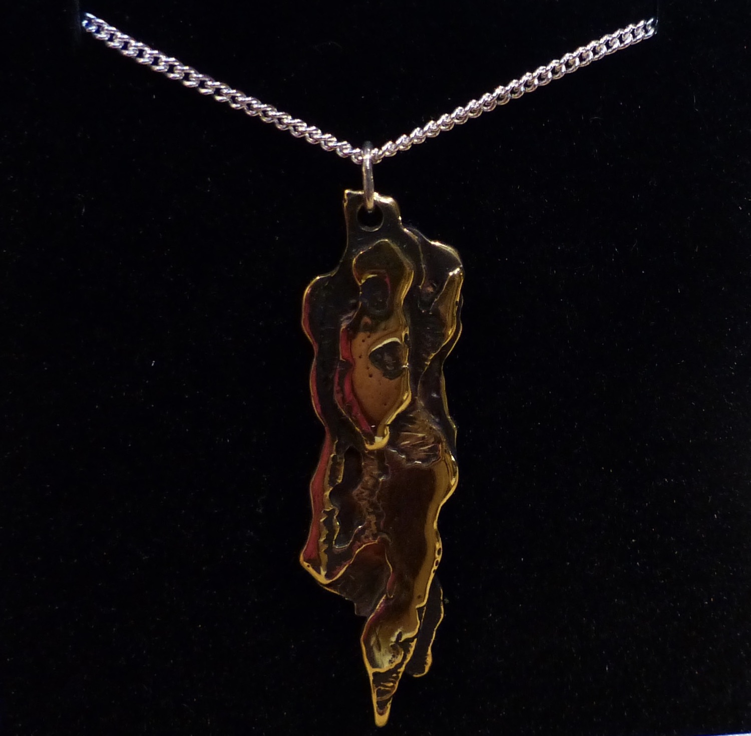 Irish penny peacock cut-out with silver chain brass reverse side