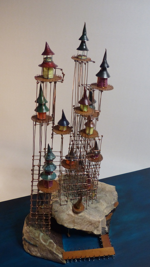 my lighthouse Island with wire scaffold and colourful huts