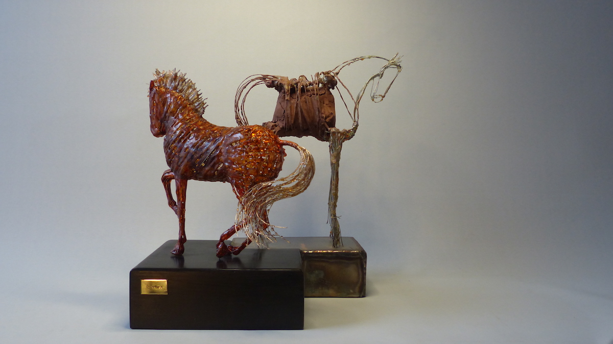 Opposites makinf eachother Horses of wire, resin, and clay