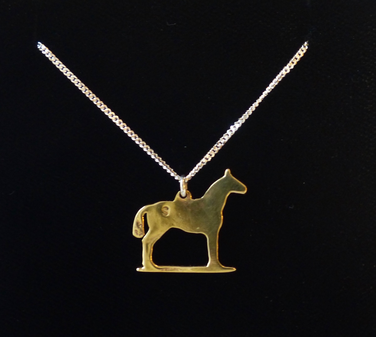 Irish twenty pence horse with silver chain brass reverse side