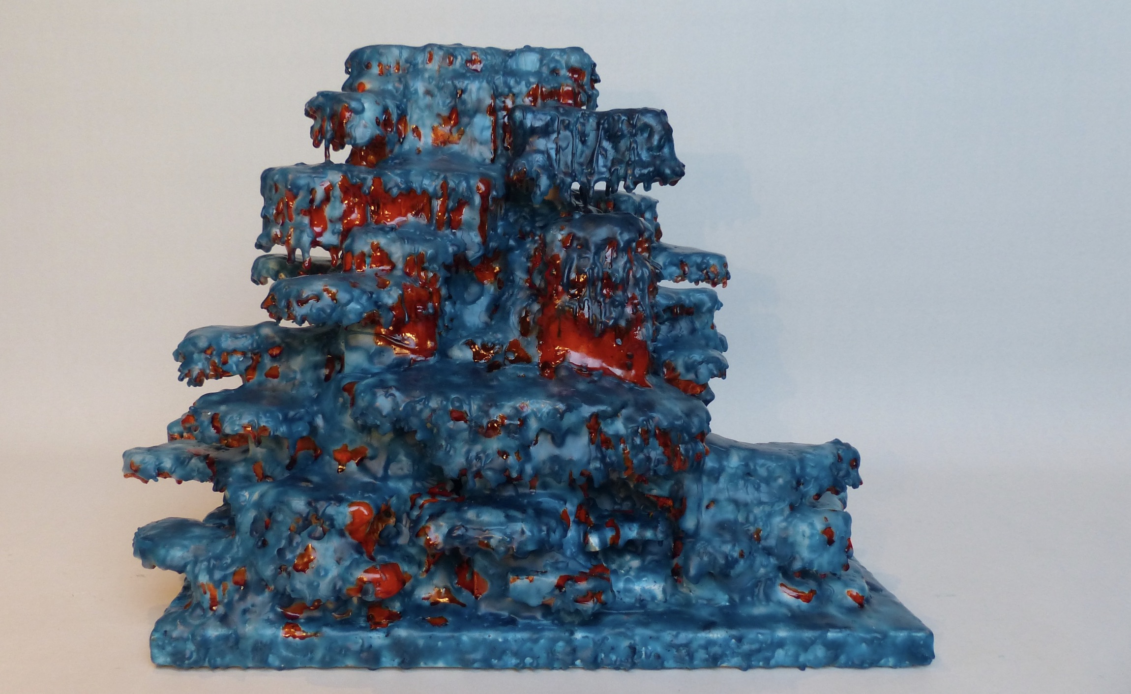 Fire Led Torquoise and Amber Wax Mountain Sculpture