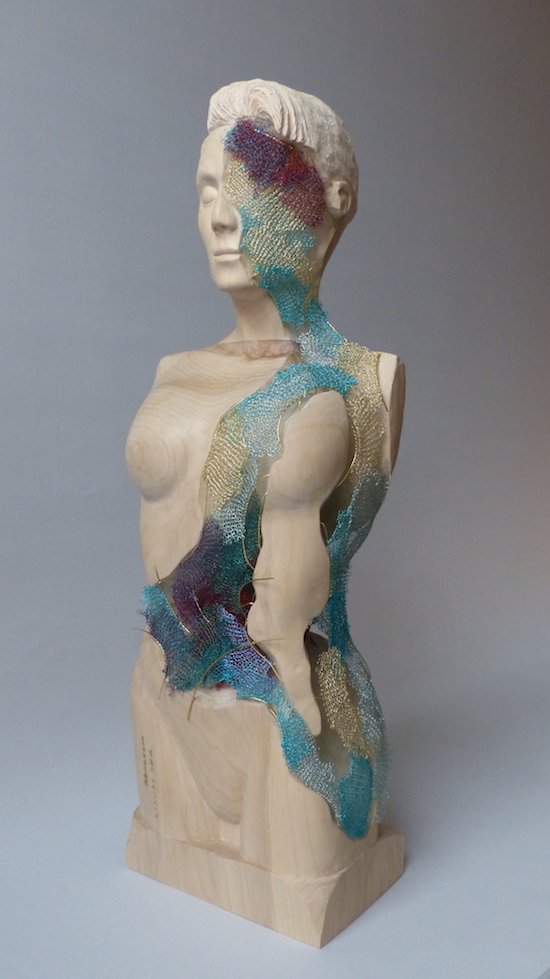 Sounding the Echoes Poplar carved female bust with coloured wire crochet